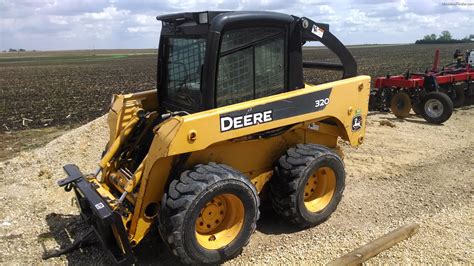 john deere skid steer solid tires|jd 320 skid steer.